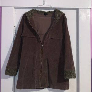 We have a Dark Brown Jacket. Modeled in it. Very popular coat to have